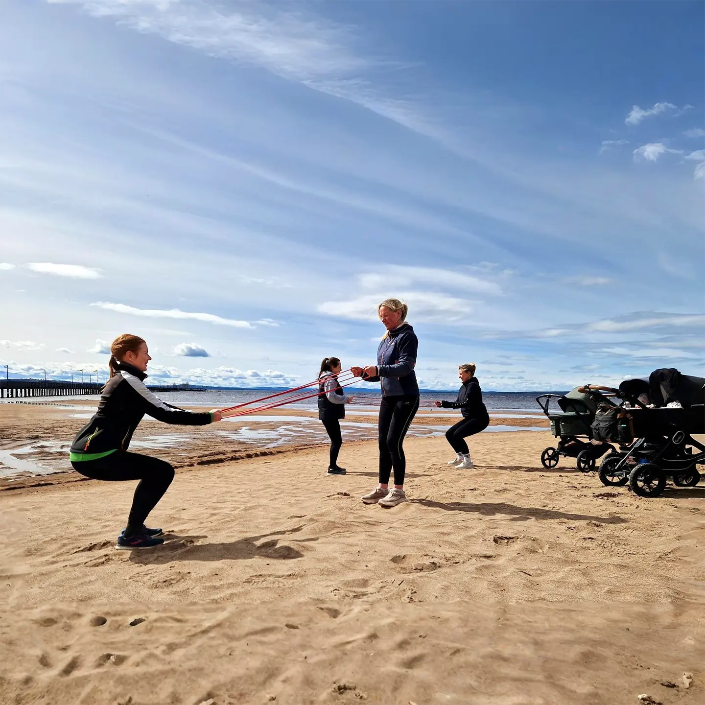 Mammaträning i grupp utomhus